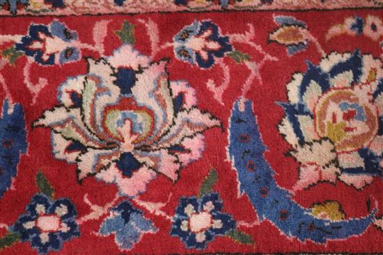 An Isfahan ivory ground carpet 340 x 235cm